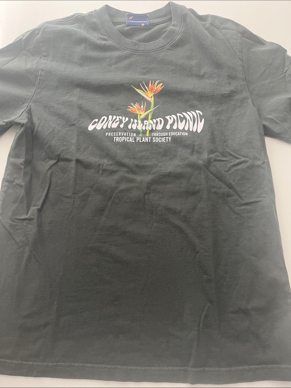Coney Island Picnic Black Graphic Short Sleeve Tee, Tropical Plant Society